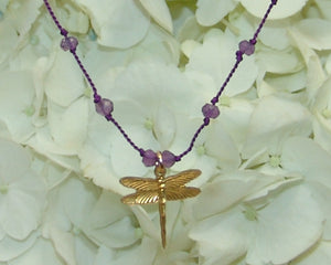 dragonfly pendant on purple silk necklace
